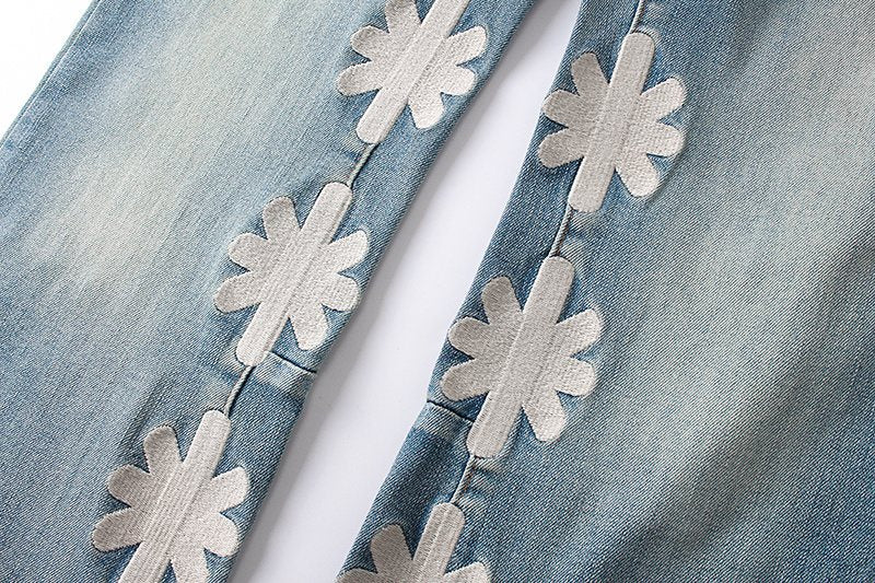 LOSTSHDWS Light Blue Daisy Applique Flared Jeans — detail