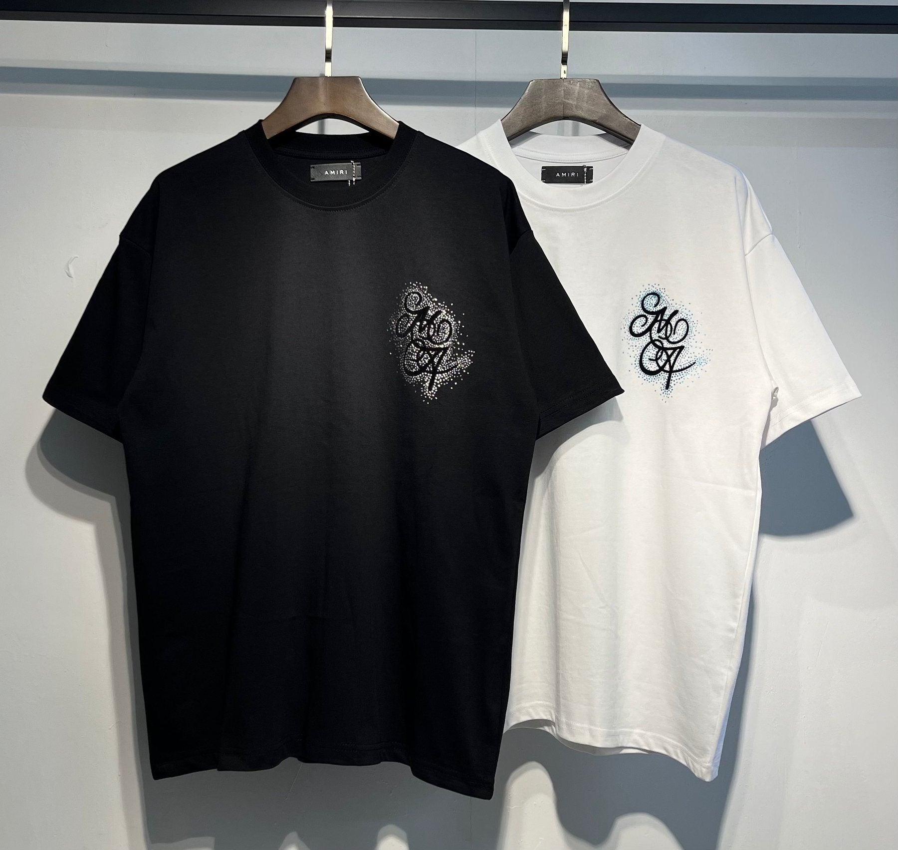 AMIRI Flocked Letter Graphic T-Shirt — comparison
