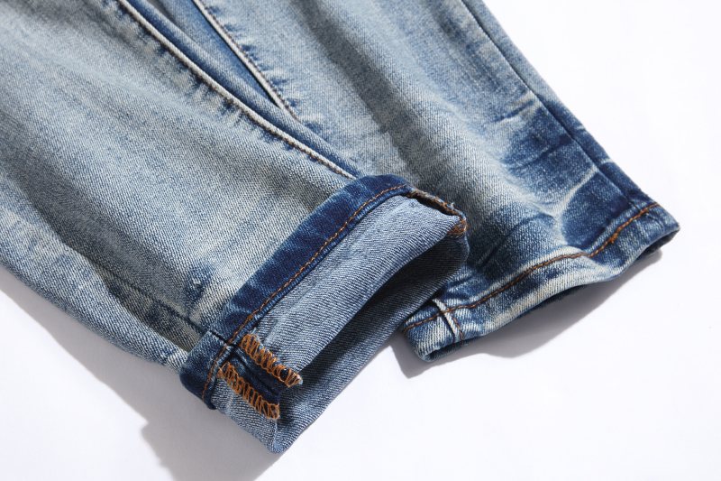 Amiri Light Blue Distressed Denim Jeans — detail