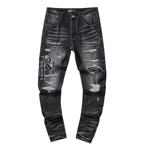 AMIRI Black Distressed Letter Graphic Jeans — hero