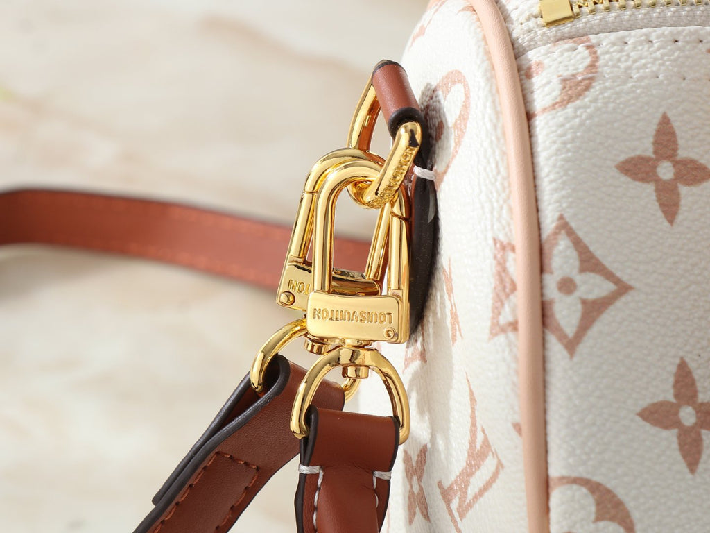 Louis Vuitton Crafty Speedy Bandoulière Handbag — detail