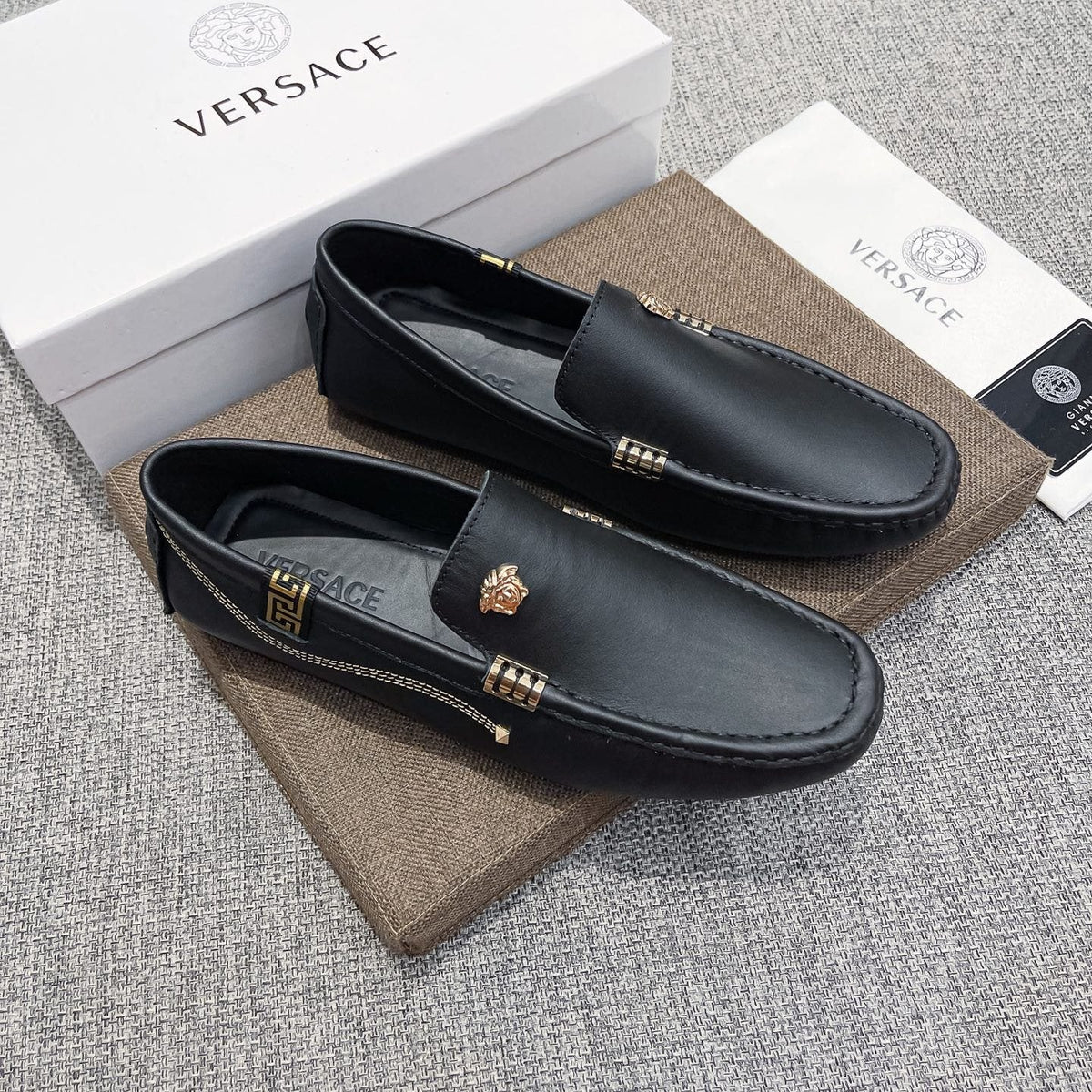 Versace Black Leather Loafers with Gold-Tone Accents — front
