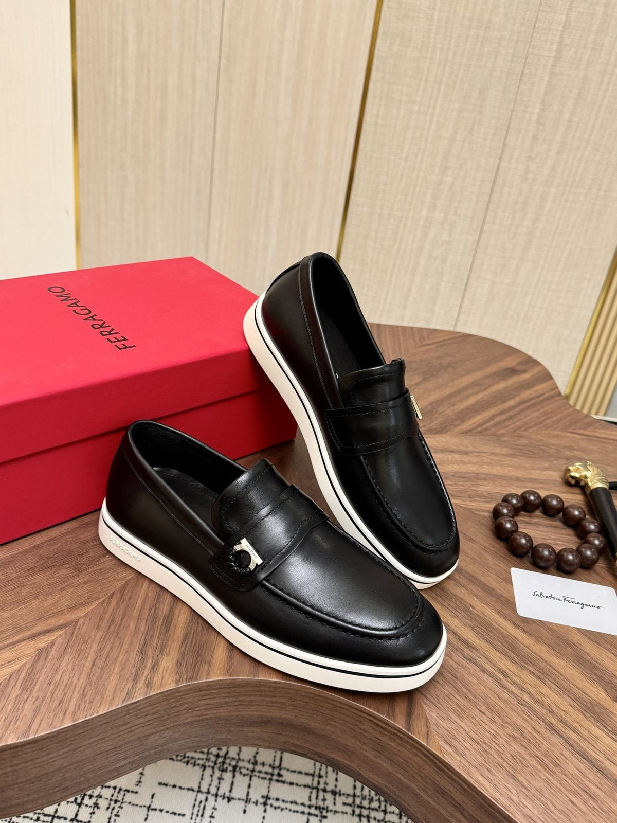 Salvatore Ferragamo Black Loafers with White Soles — front