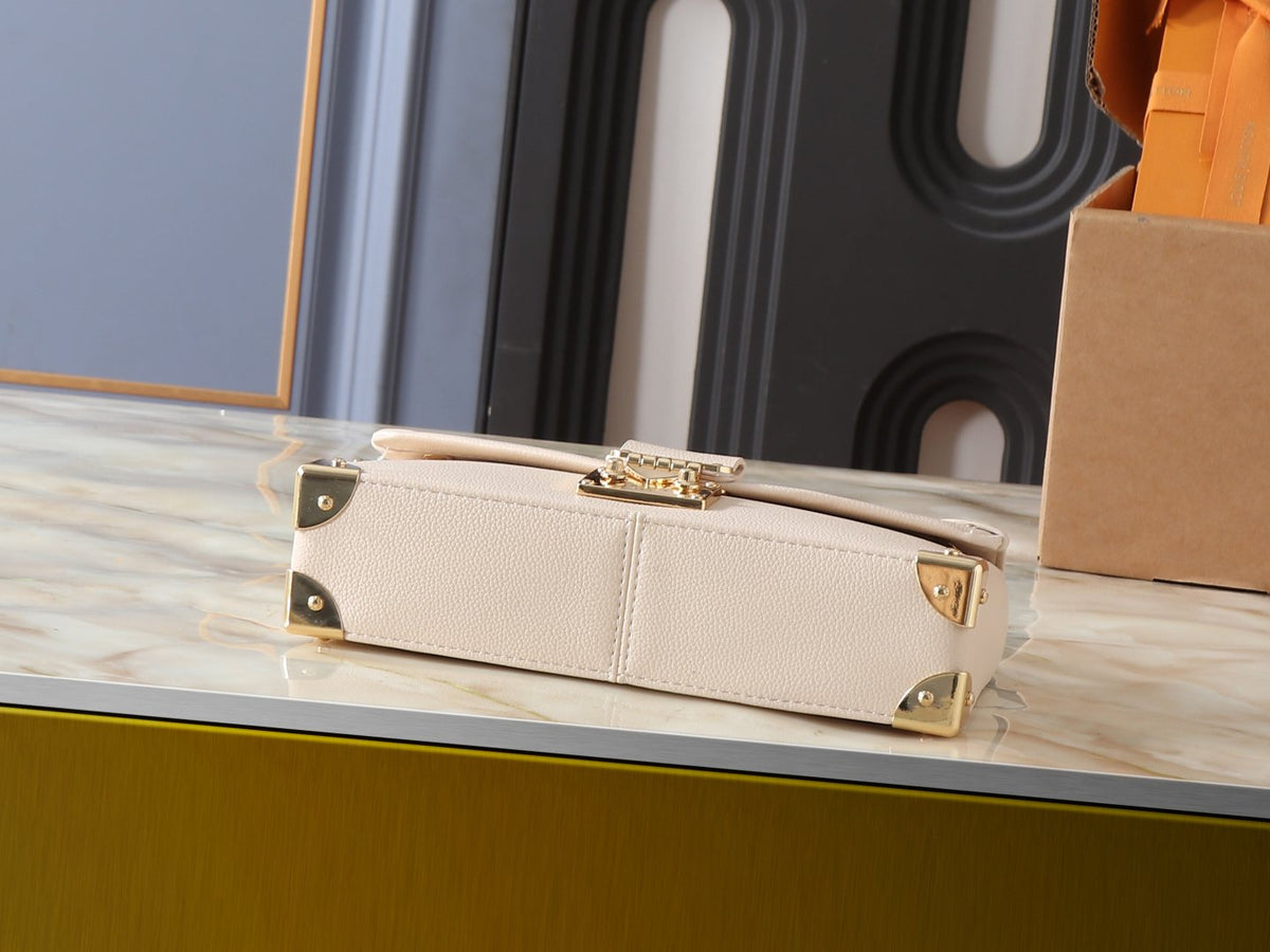 Louis Vuitton Trunkie East West Cream Shoulder Bag — detail