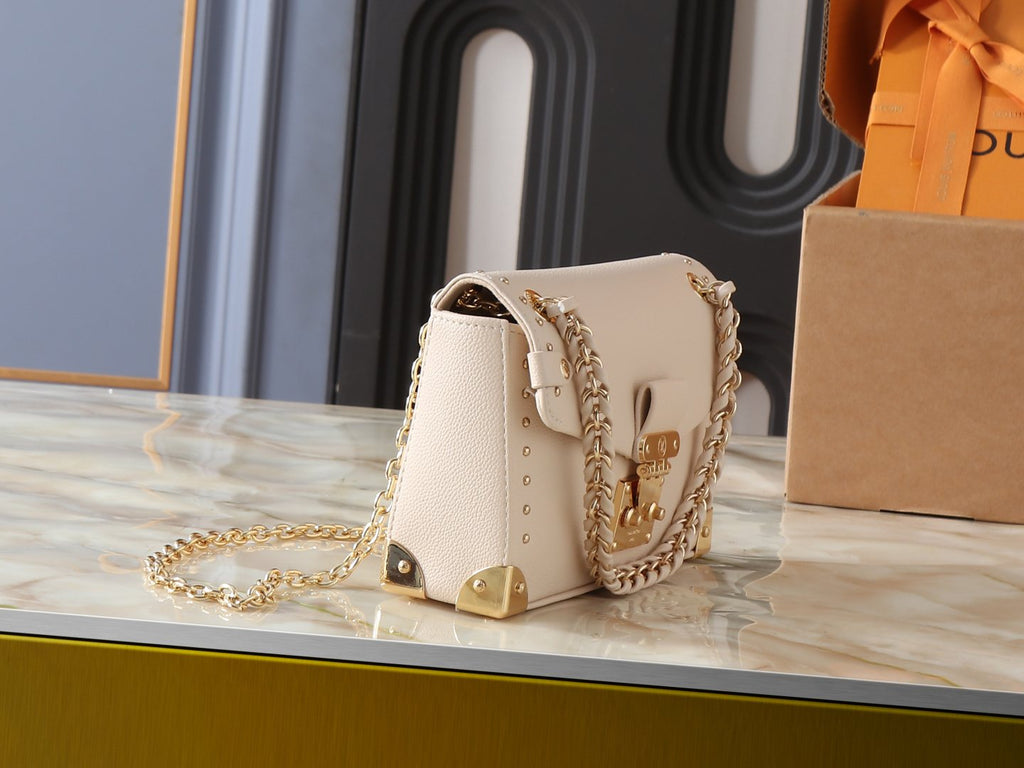 Louis Vuitton Trunkie East West Cream Shoulder Bag — side