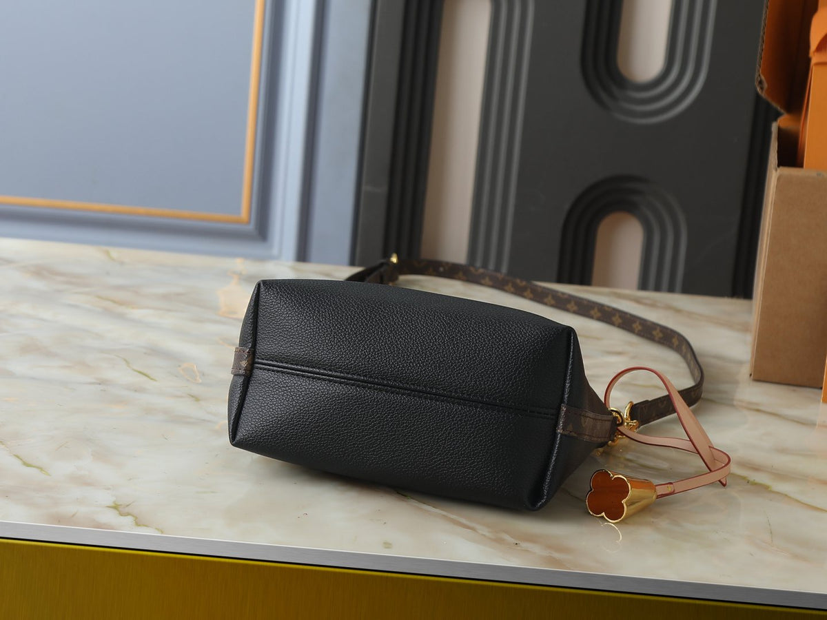 Louis Vuitton Multipass Black Monogram-Accent Handbag — detail