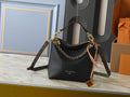 Louis Vuitton Multipass Black Monogram-Accent Handbag — hero