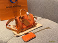 Louis Vuitton Speedy Rolled-Handle Satchel — hero