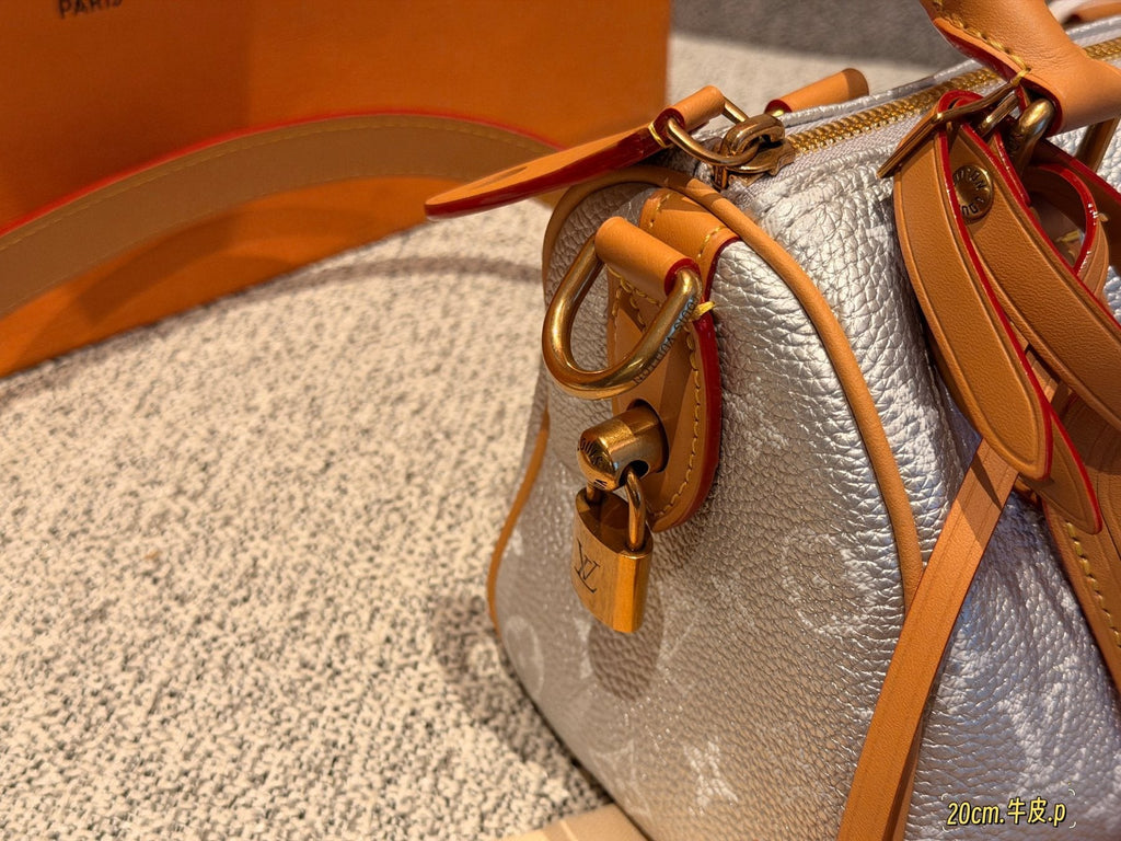 Louis Vuitton Speedy Rolled-Handle Satchel — detail