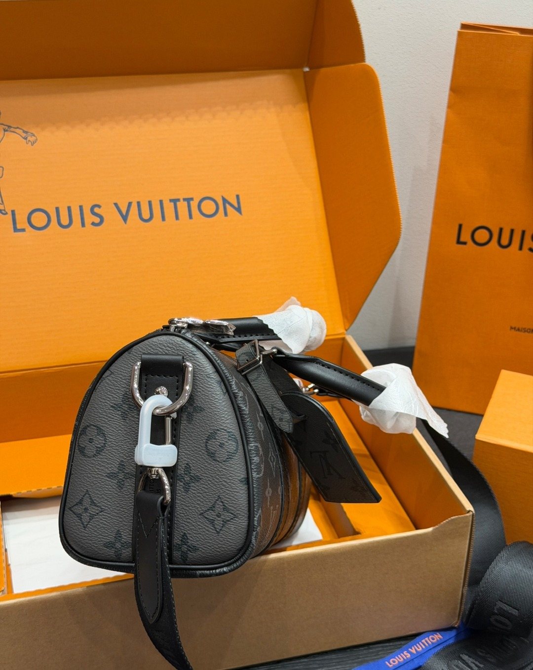Louis Vuitton Keepall Black Monogram Duffel Bag — side