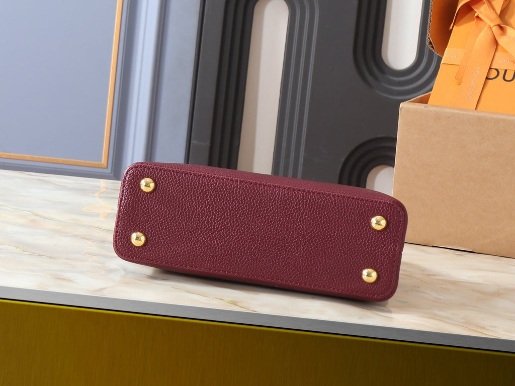Louis Vuitton Capucines Top-Handle Handbag — detail
