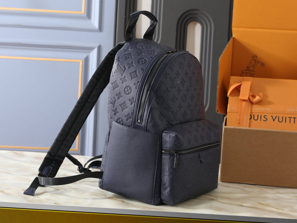 Louis Vuitton Discovery Domed Backpack — side
