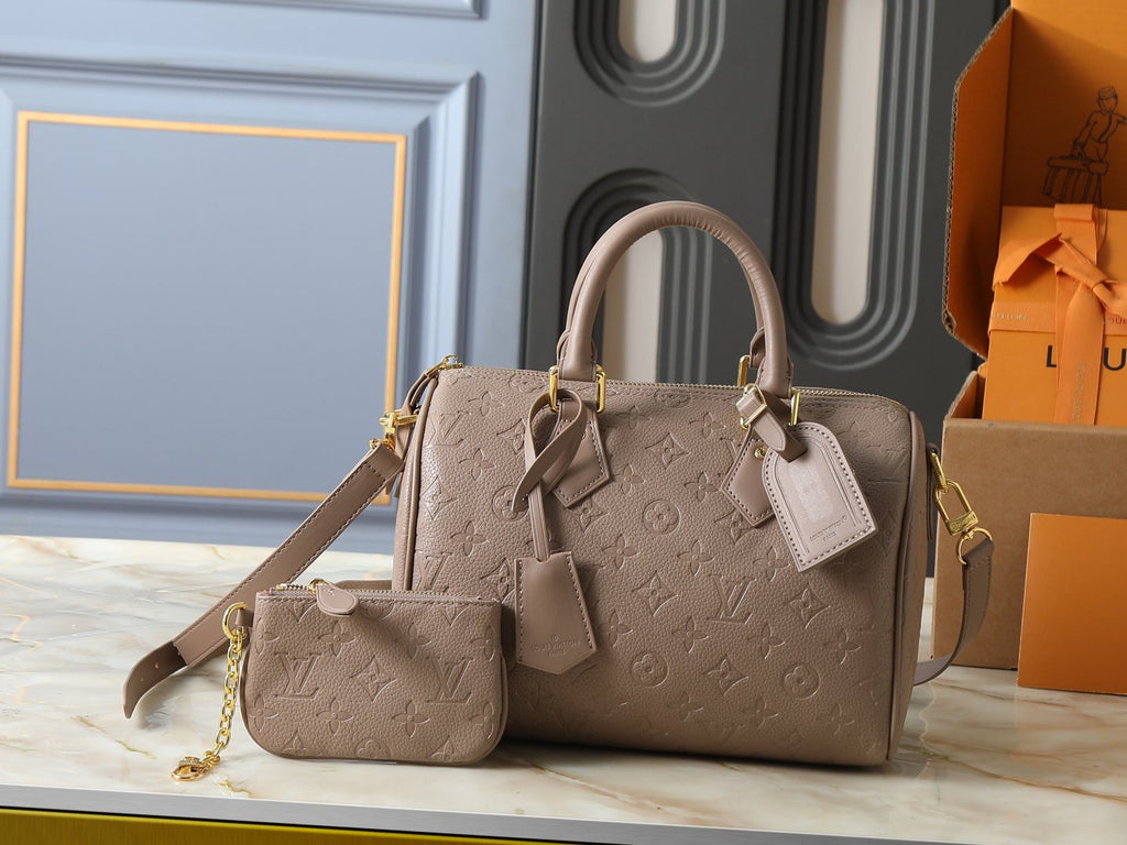 Louis Vuitton Speedy Bandoulière Embossed Monogram Bag — hero