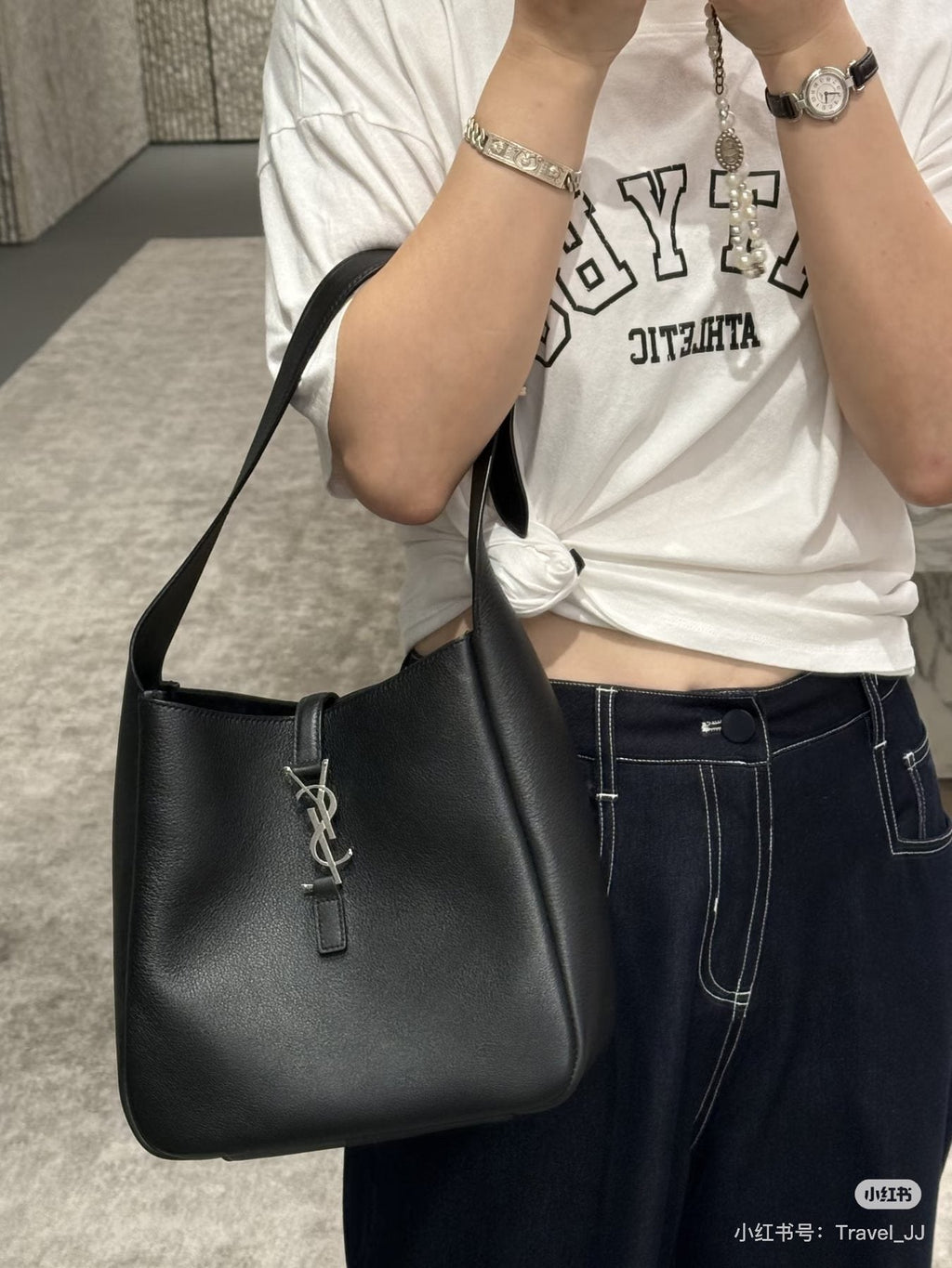 Saint Laurent Black Curved Hobo Shoulder Bag — model