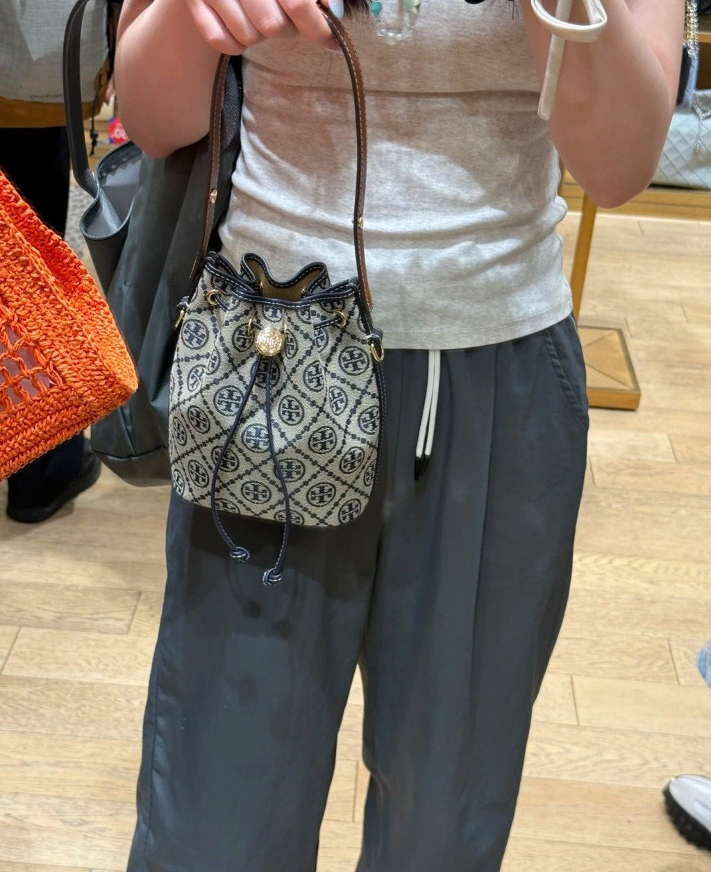 Tory Burch T Monogram Scalloped Bucket Bag — model