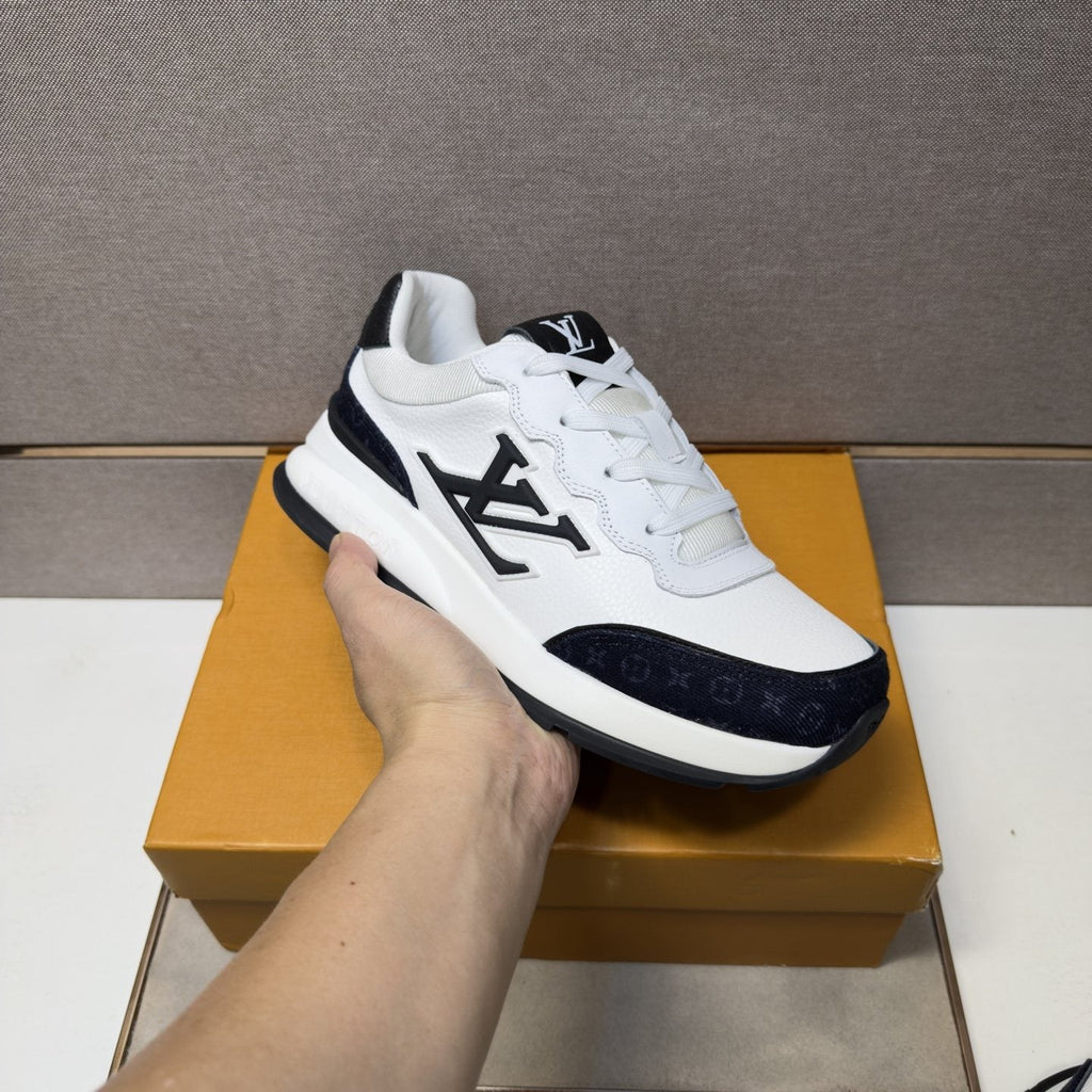 Louis Vuitton Contrast-Trim Low-Top Sneakers — model