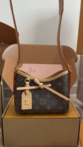 Louis Vuitton Nano Carryall Monogram Handbag — hero