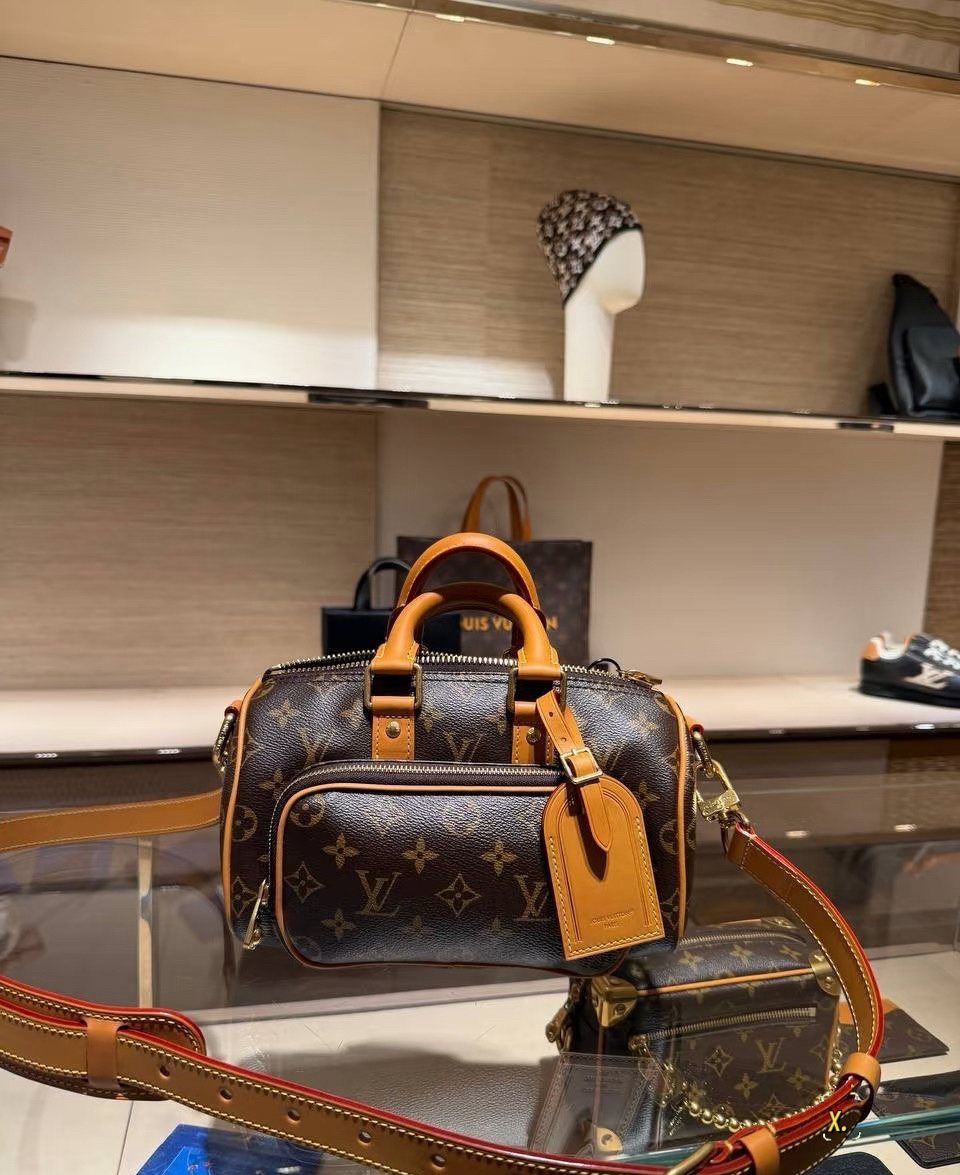 Louis Vuitton Keepall Front Pocket Barrel Bag — front