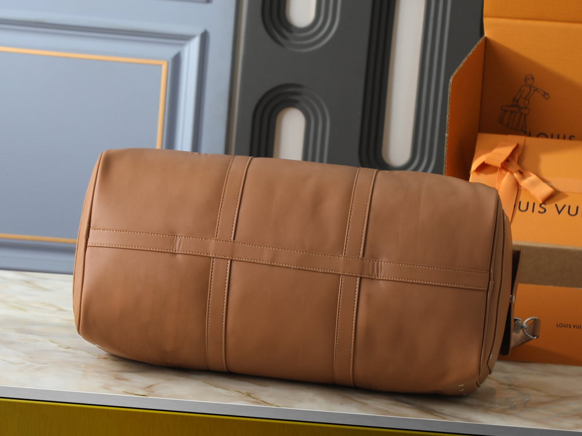 Louis Vuitton Keepall Studded Tan Duffel Bag — detail
