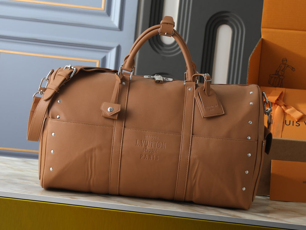 Louis Vuitton Keepall Studded Tan Duffel Bag — hero
