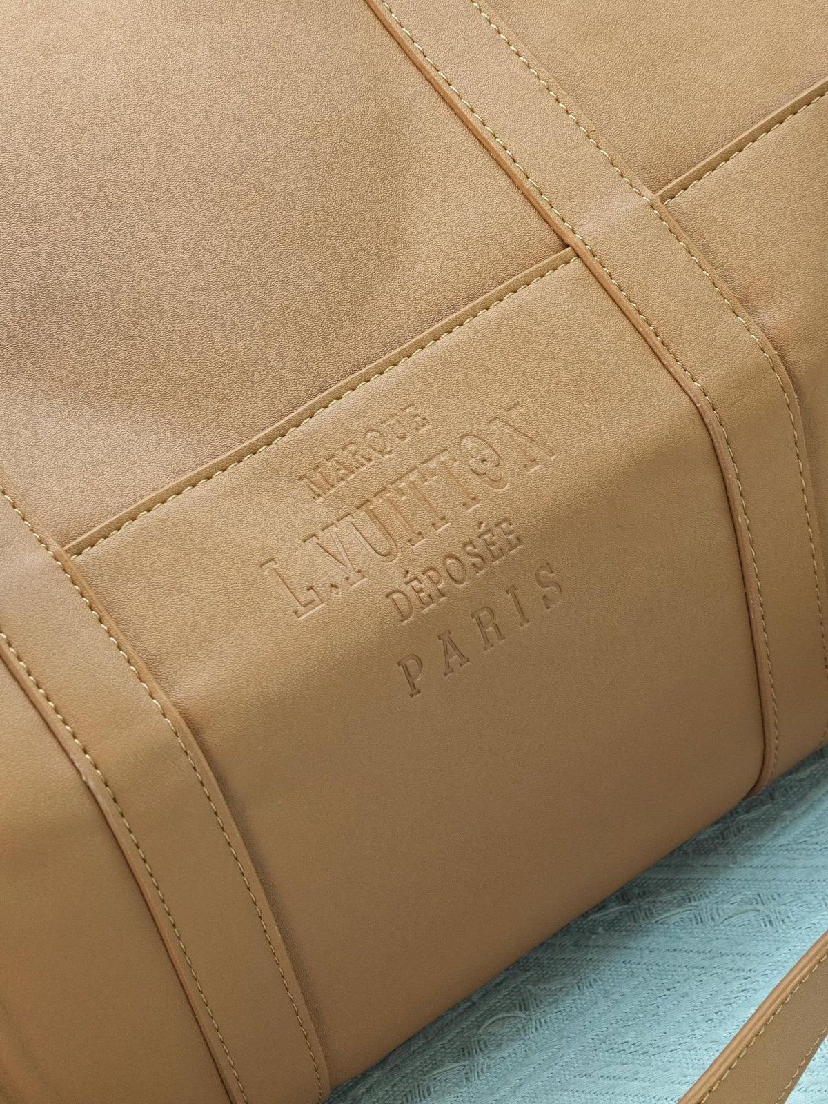 Louis Vuitton Keepall Studded Tan Duffel Bag — detail