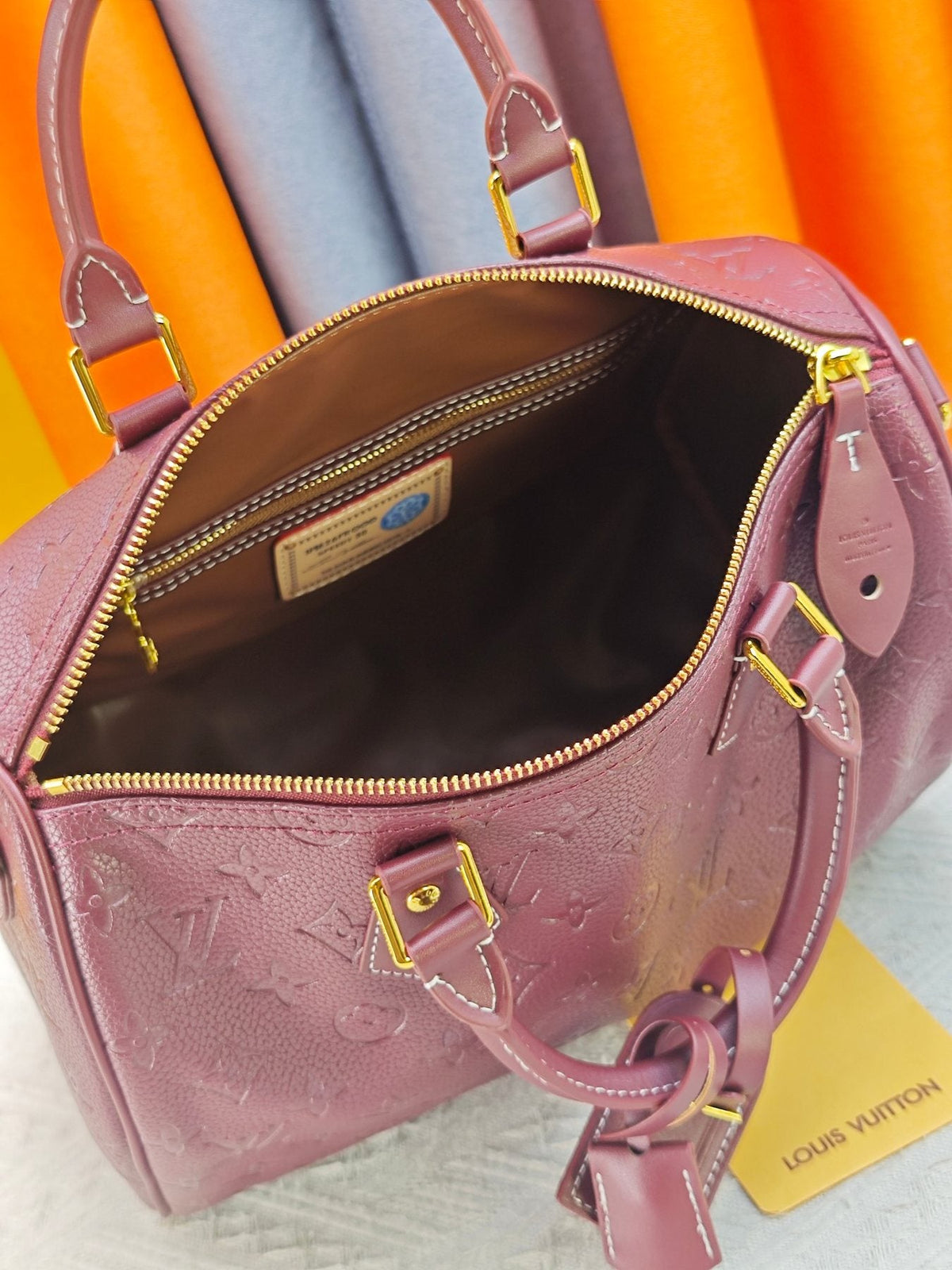 Louis Vuitton Speedy Bandoulière Burgundy Embossed Monogram Bag — detail