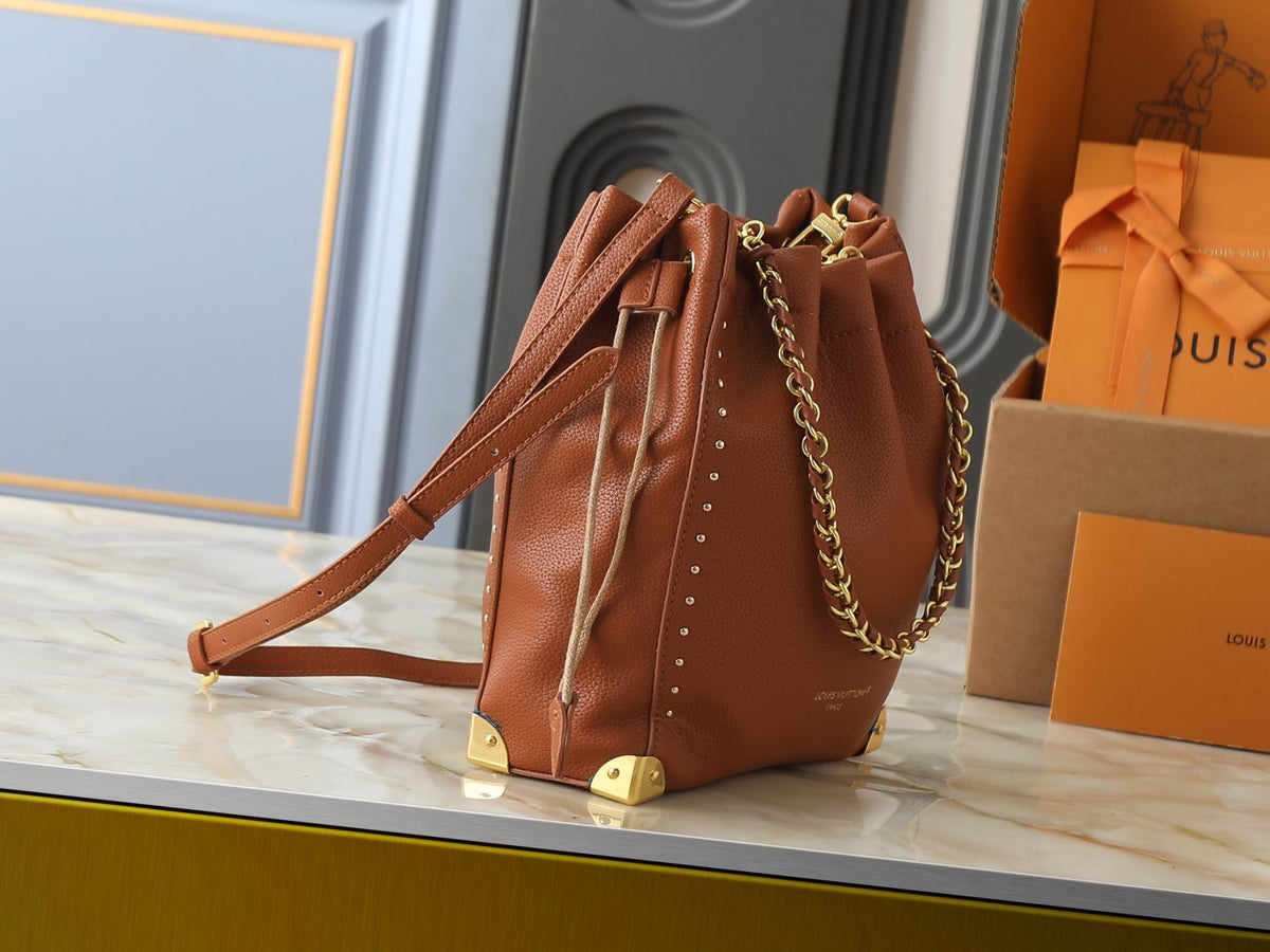 Louis Vuitton Noé Trunk Drawstring Bucket Bag — side