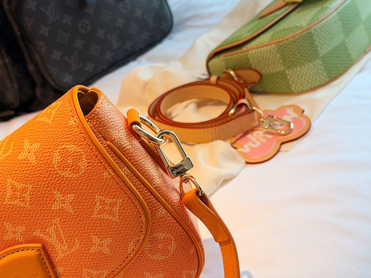 Louis Vuitton Curved-Flap Messenger Bag — detail
