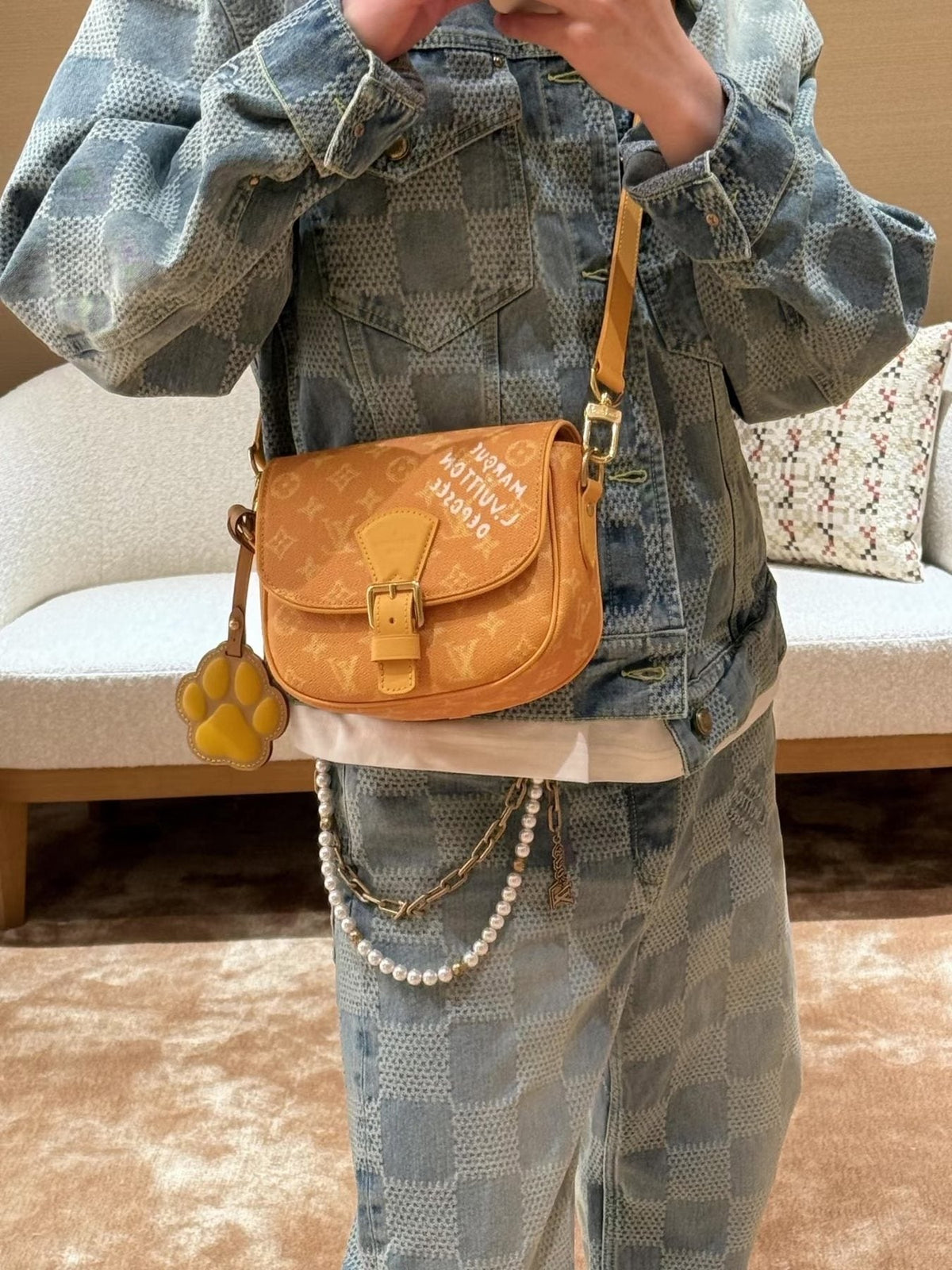 Louis Vuitton Curved-Flap Messenger Bag — model