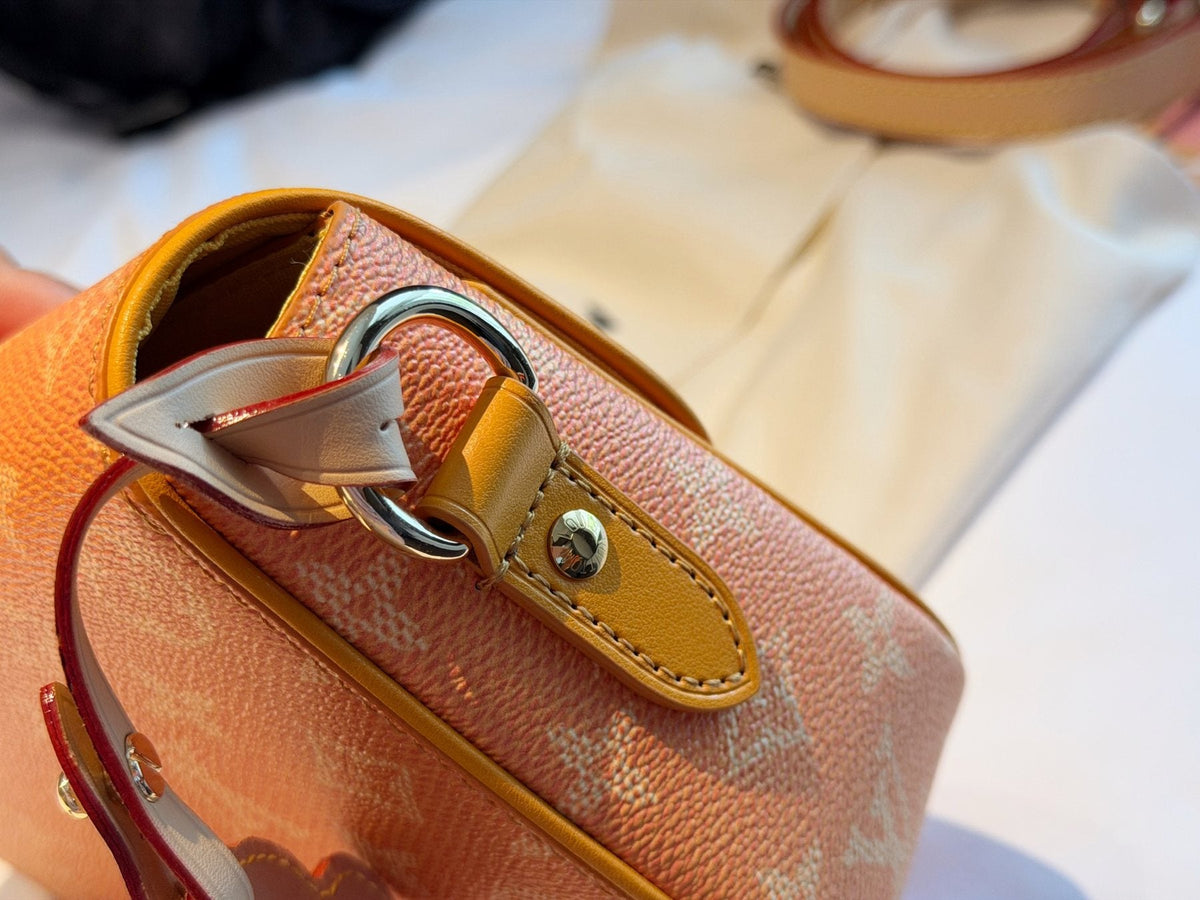 Louis Vuitton Curved-Flap Messenger Bag — detail