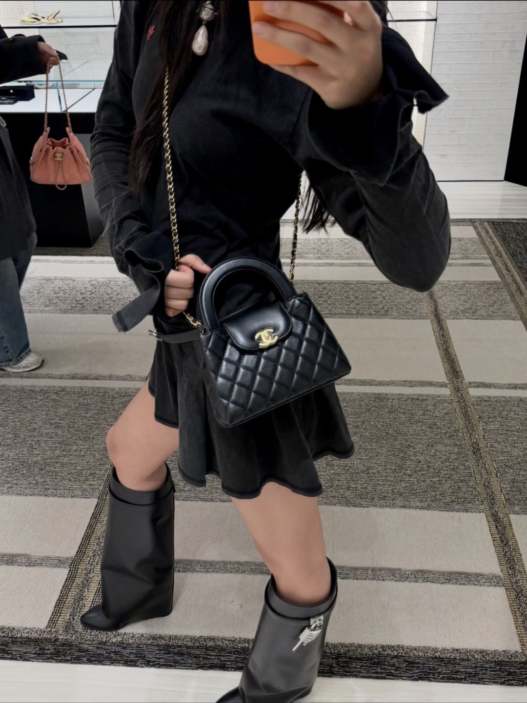 Chanel Kelly Quilted Top-Handle Bag — model