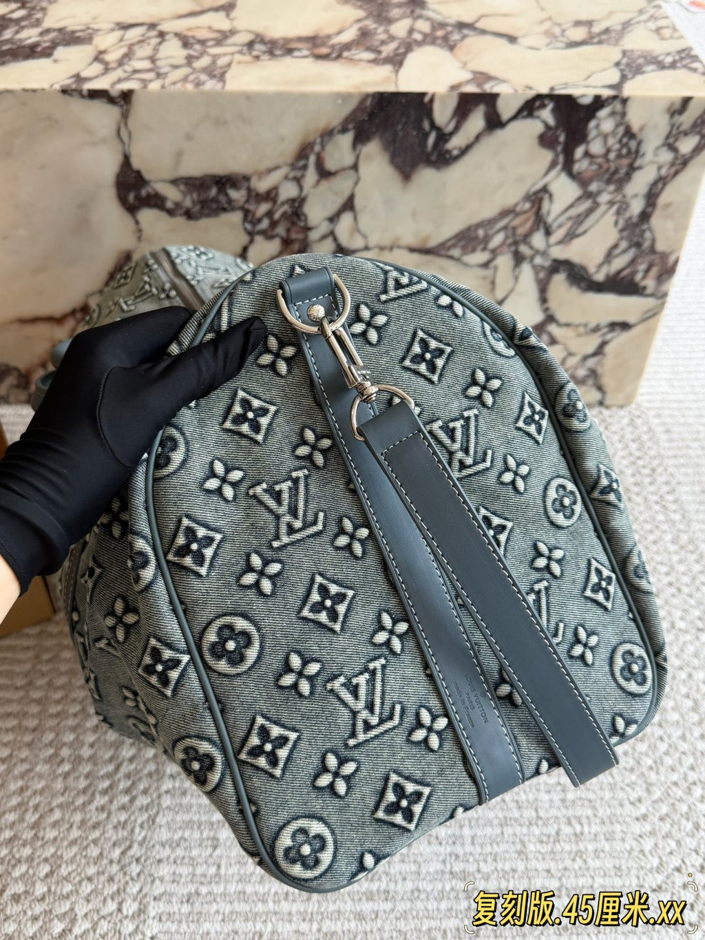 Louis Vuitton Keepall Monogram Travel Duffel — side