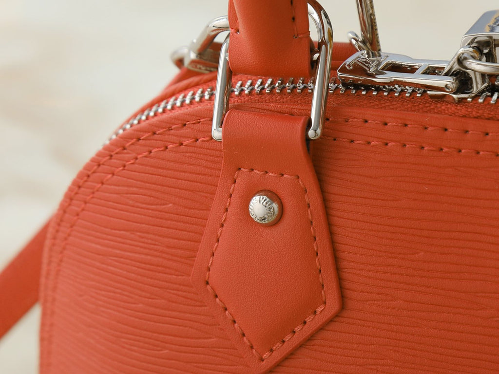 Louis Vuitton Alma BB Domed Top-Handle Bag — detail