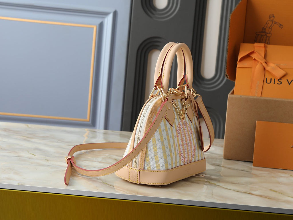 Louis Vuitton Alma BB Domed Top-Handle Bag — side