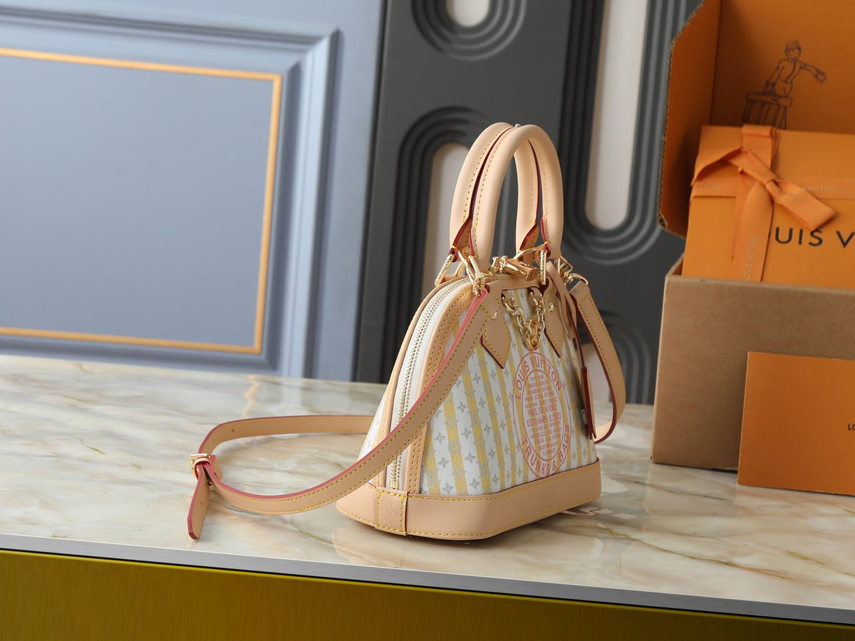 Louis Vuitton Alma BB Domed Top-Handle Bag — side