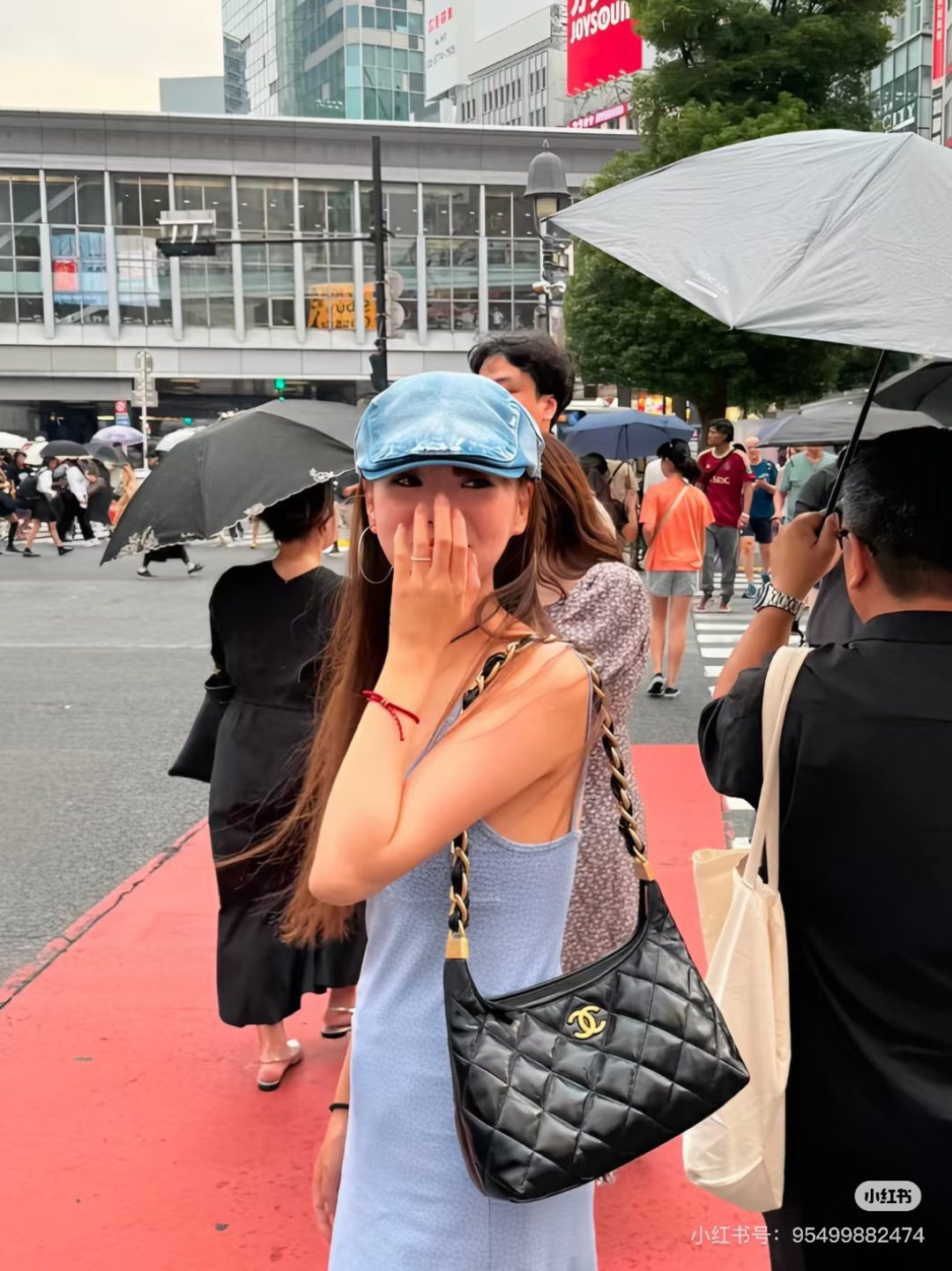 Chanel Diamond-Quilted Chain Hobo Bag — model