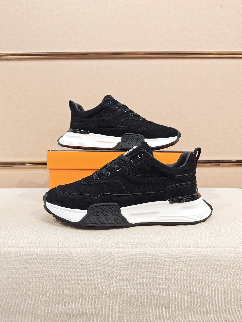 Hermès Lace-Up Sculpted-Sole Sneakers — side