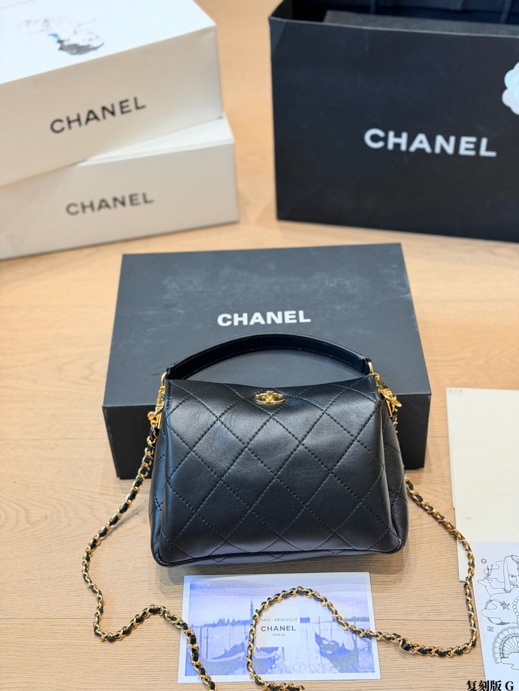 Chanel Rounded Diamond-Quilted Top-Handle Bag — hero