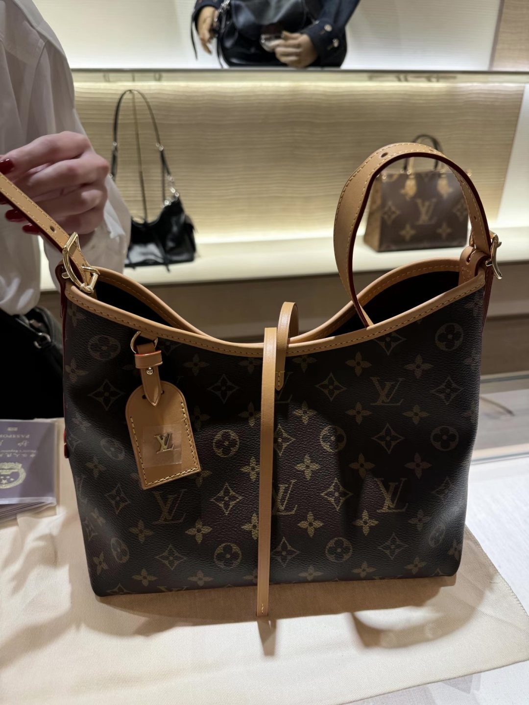 Louis Vuitton Carryall Monogram Shoulder Bag — hero