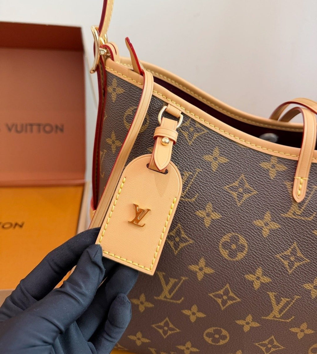 Louis Vuitton Carryall Monogram Shoulder Bag — detail