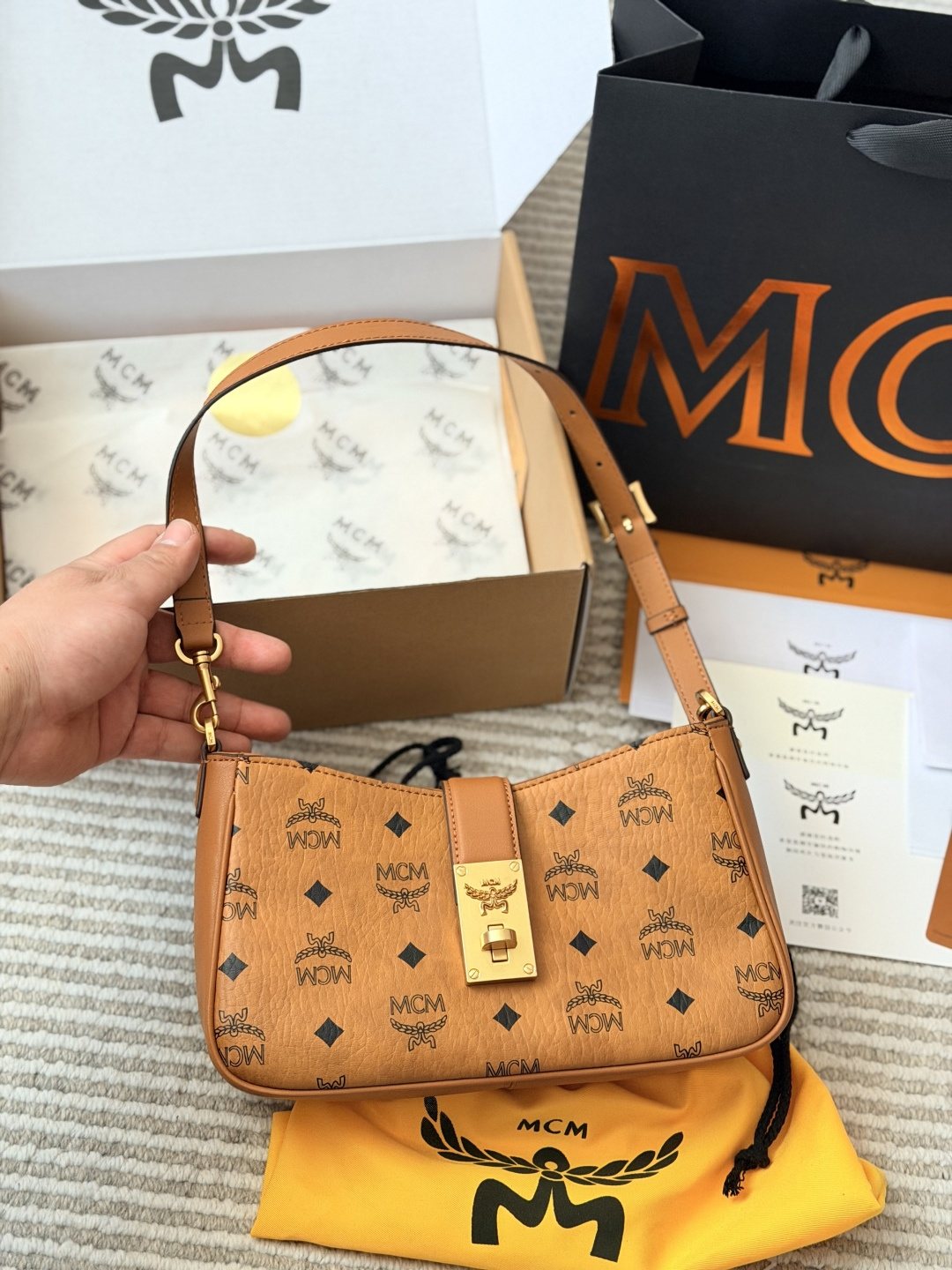MCM Monogram Hobo Bag with Gold-Tone Clasp — hero