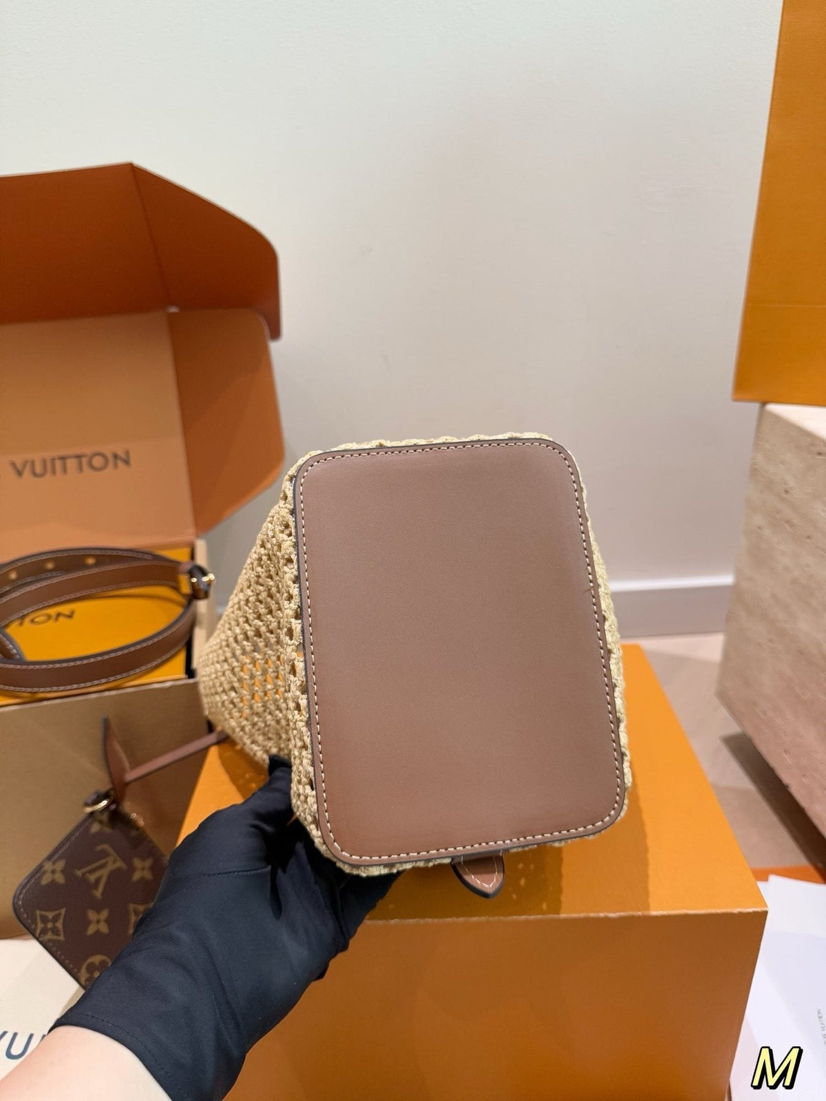 Louis Vuitton Woven Bucket Bag with Monogram Pouch — detail