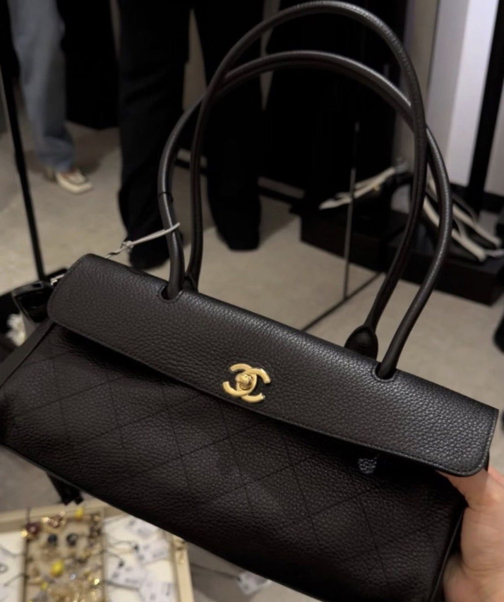 Chanel Quilted Baguette Shoulder Bag — detail