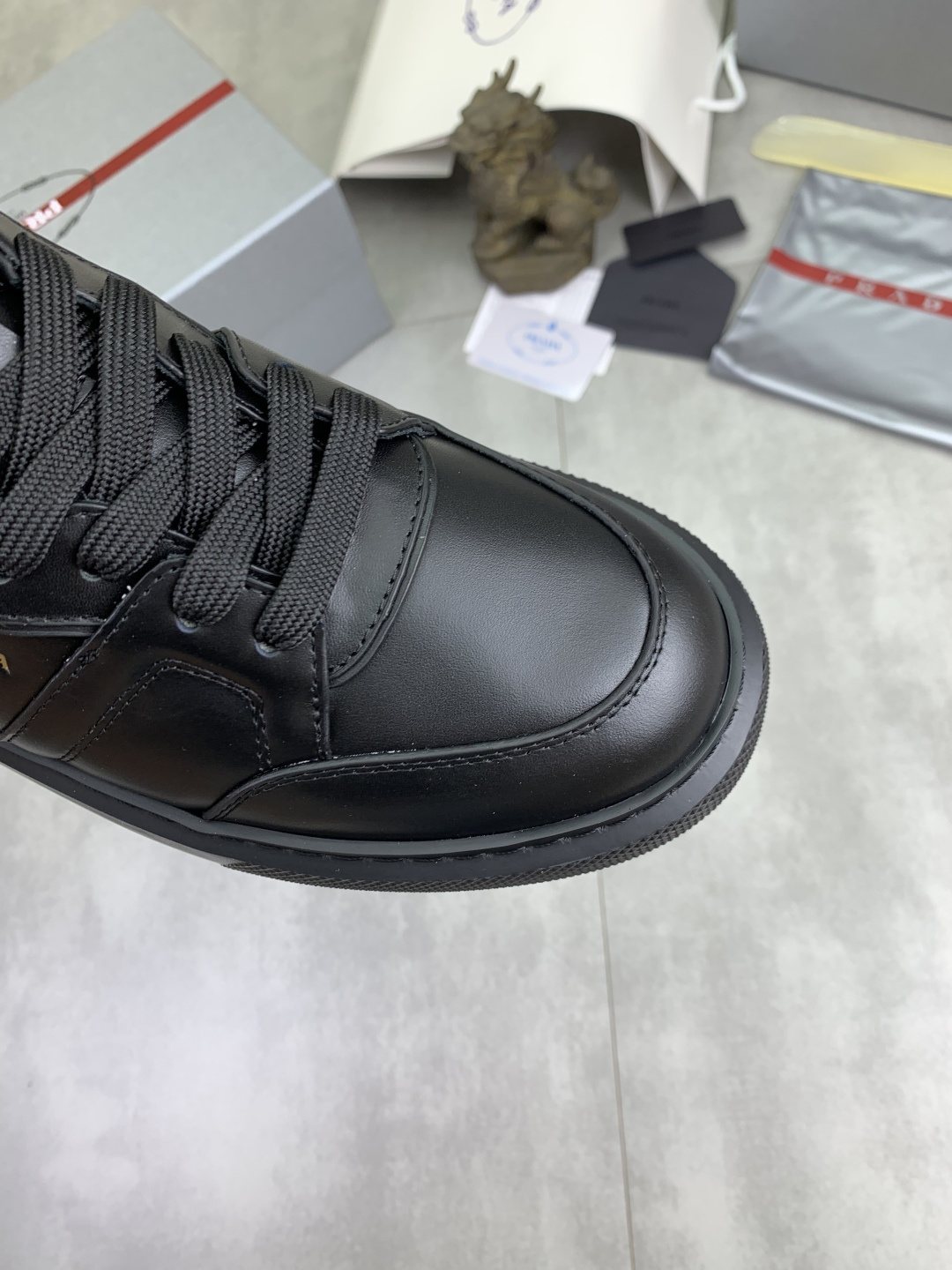 Prada Paneled Low-Top Sneakers — detail