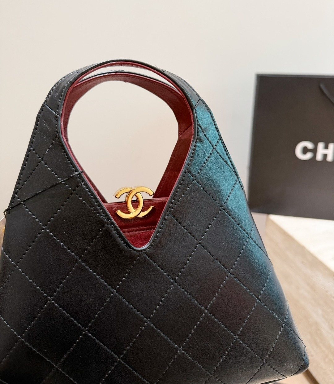 Chanel Diamond-Quilted Integrated-Handle Hobo Bag — detail