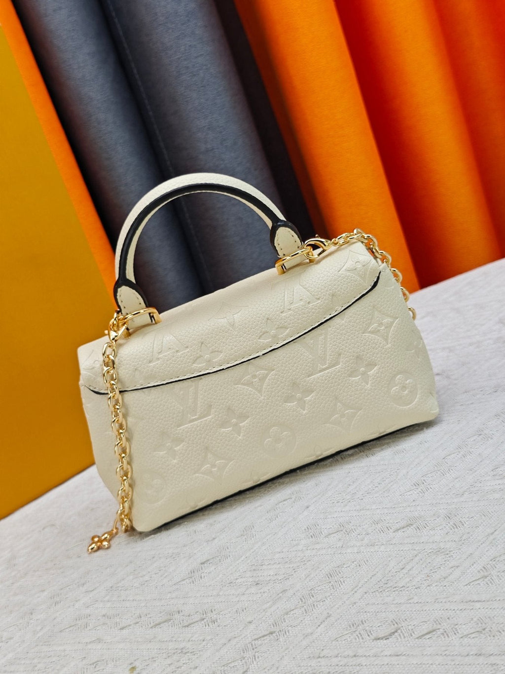 Louis Vuitton Nano Madeleine Monogram Empreinte Handbag — back