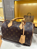 Louis Vuitton Speedy Monogram Duffel-Style Handbag — hero