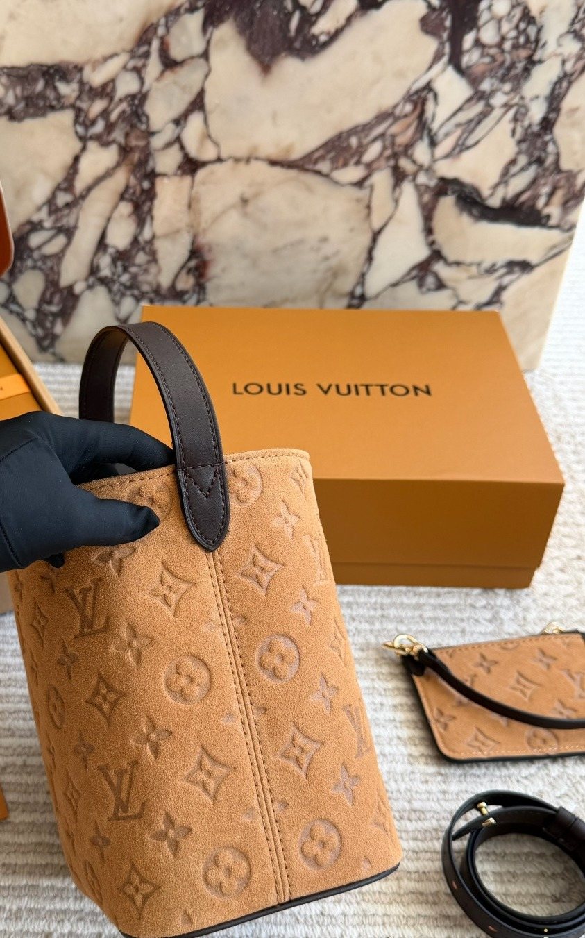 Louis Vuitton Tan Embossed Monogram Bucket Bag — side