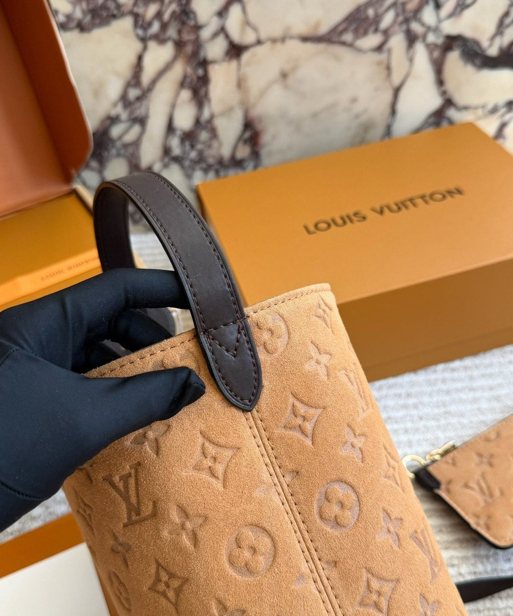 Louis Vuitton Tan Embossed Monogram Bucket Bag — side