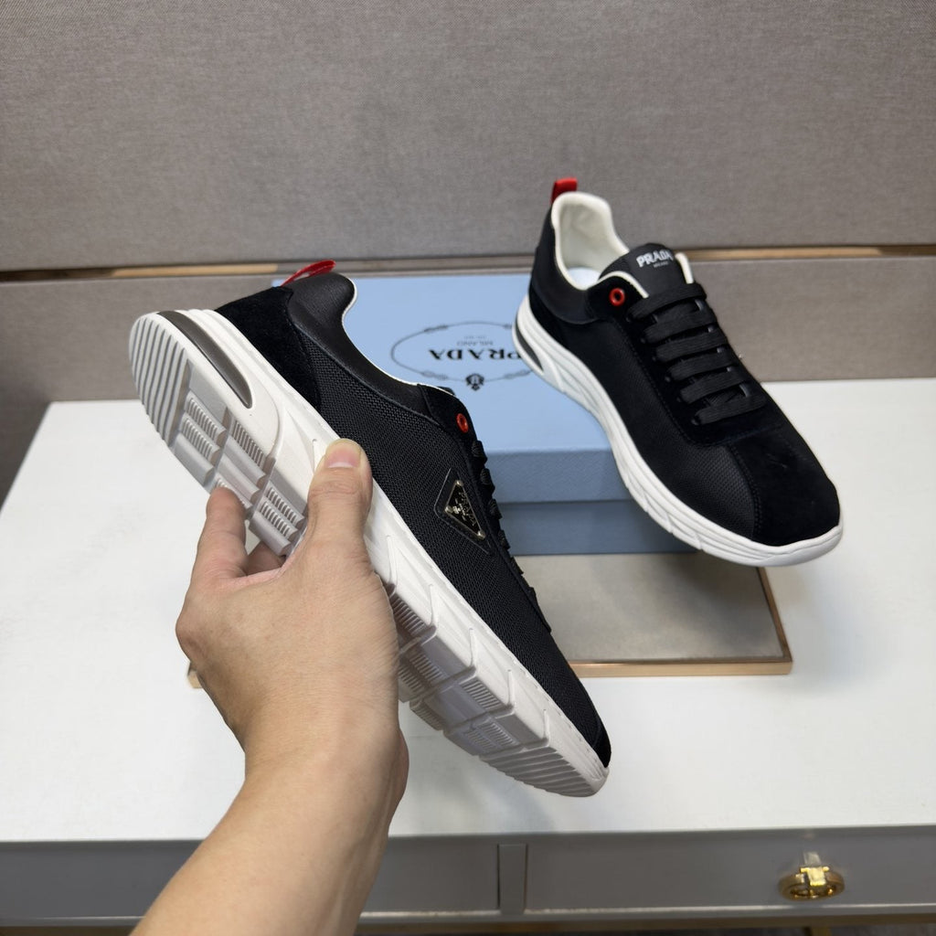Prada Paneled Low-Top Sneakers — model